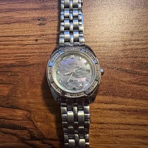 Ladies citizen eco drive silver watch with mother of pearl face